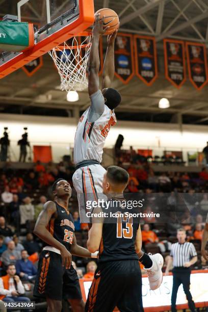 Bowling Green guard/forward Daeqwon Plowden goes in for a dunk during a game between the Bowling Green State University Falcons and Lourdes...