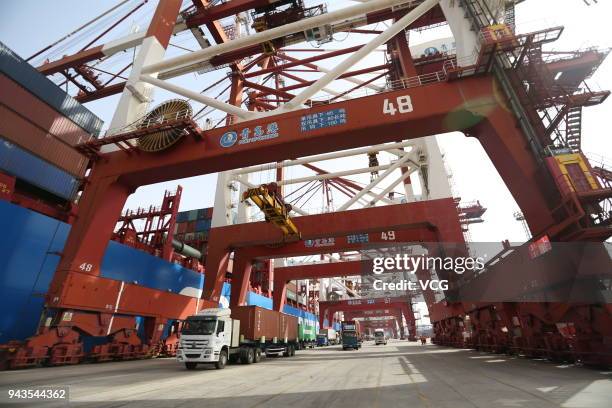 Containers are being transferred at Qingdao Port on April 8, 2018 in Qingdao, Shandong Province of China. China has been prepared to strike back if...