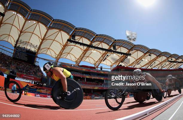 Kurt Fearnley of Australia and Nathan Maguire of England compete in the Men's T54 1500m heats during the Athletics on day five of the Gold Coast 2018...