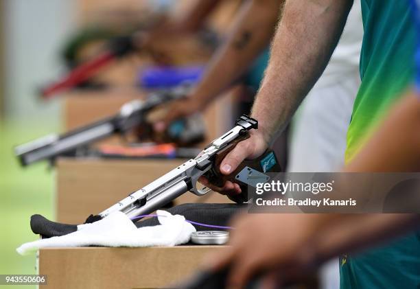 Shooters prepare to take their shot in the final of the Men's 10m Air Pistol during Shooting on day five of the Gold Coast 2018 Commonwealth Games at...