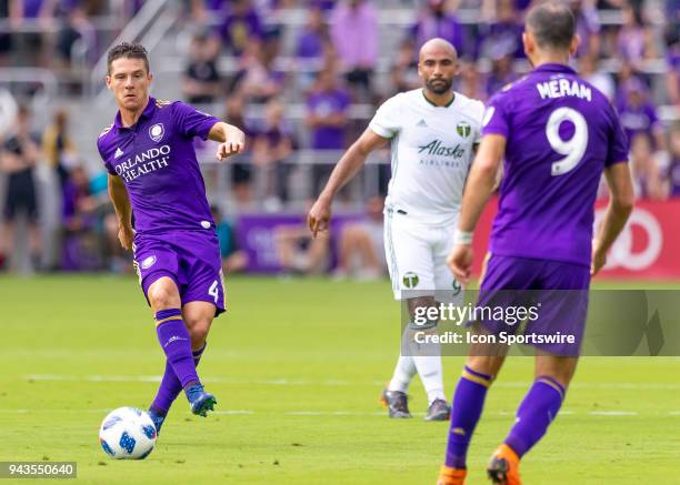 Orlando City midfielder Will Johnson passes the ball during the MLS soccer match between the Orlando City FC and the Portland Timbers at Orlando City...