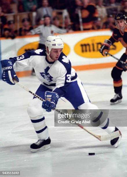 Al Iafrate of the Toronto Maple Leafs skates against the Vancouver Canucks during NHL game action on January 9, 1989 at Maple Leaf Gardens in...