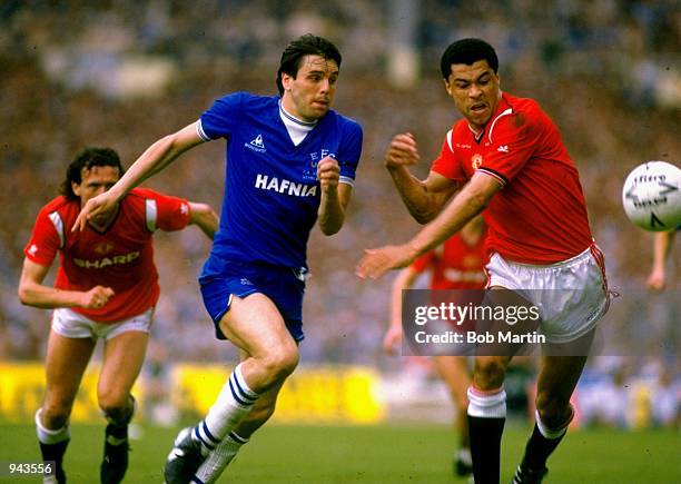 Graham Sharpe of Everton and Paul McGrath of Manchester United in action during the FA Cup Final at Wembley Stadium in London. Manchester United won...