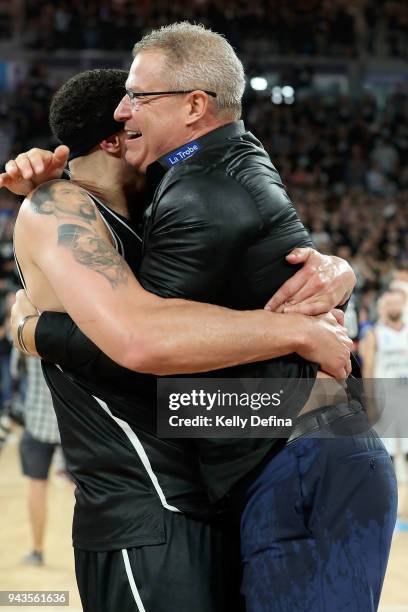 Melbourne United head coach Dean Vickerman celebrates victory with Josh Boone of Melbourne United after game five of the NBL Grand Final series...