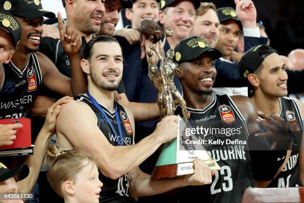 Chris Goulding and Casey Prather of Melbourne United celebrate their victory after game five of the NBL Grand Final series between Melbourne United...