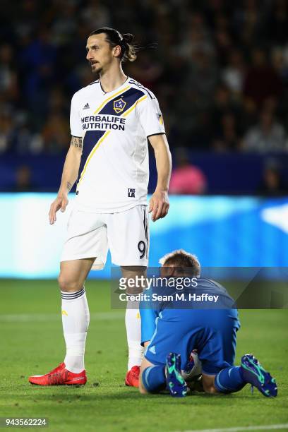 Zlatan Ibrahimovic of Los Angeles Galaxy looks on as Tim Melia of Sporting Kansas City makes a save during the second half of a game at StubHub...