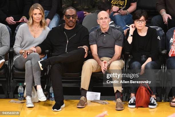 Paige Butcher, Eddie Murphy, Jeffrey Katzenberg and Marilyn Katzenberg attend a basketball game between the Los Angeles Lakers and the Utah Jazz at...