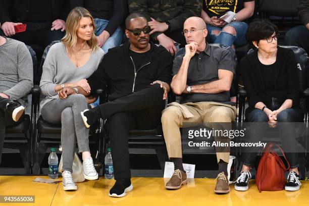 Paige Butcher, Eddie Murphy, Jeffrey Katzenberg and Marilyn Katzenberg attend a basketball game between the Los Angeles Lakers and the Utah Jazz at...