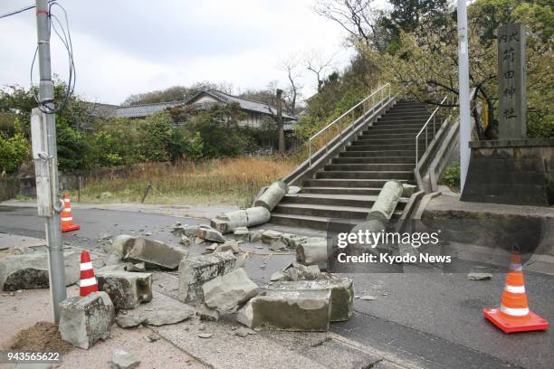 The entrance gate of a shrine is seen collapsed in Oda, Shimane Prefecture, after a magnitude 6.1 earthquake hit the western Japanese prefecture on...