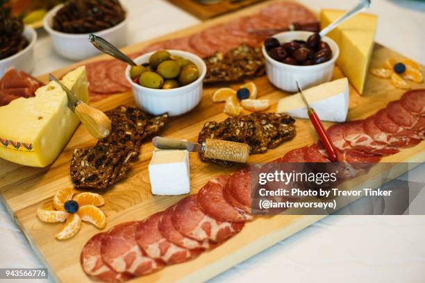 cheese and charcuterie board - lavash stock-fotos und bilder