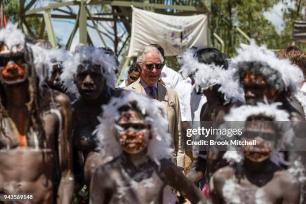 Prince Charles, Prince of Wales is led away after a Welcome to Country Ceremony on April 9, 2018 in Gove, Australia. The Prince of Wales and Duchess...