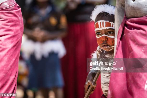 Young boy waits to perform for the Prince of Wales on April 9, 2018 in Gove, Australia. The Prince of Wales and Duchess of Cornwall are on a...