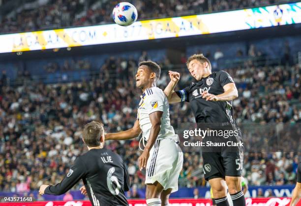 Matt Besler of Sporting Kansas City heads the ball clear during the Los Angeles Galaxy's MLS match against Sporting Kansas City at the StubHub Center...