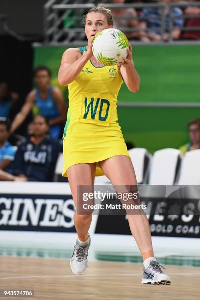 Gabi Simpson of Australia looks to pass the ball during the Netball Preliminary round match between Fiji and Australia on day five of the Gold Coast...
