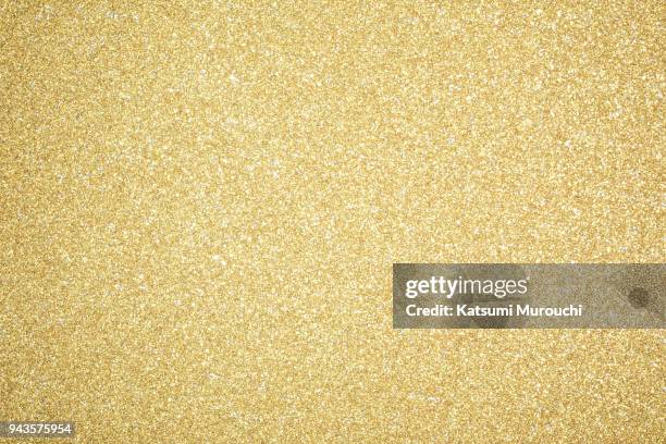 glitter sheet texture background - gold glitter ストックフォトと画像