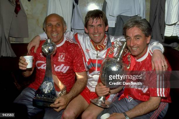 Liverpool Manager Kenny Dalglish celebrates with coaches Ronnie Moran and Roy Evans after the Barclays League Division One match against Derby County...