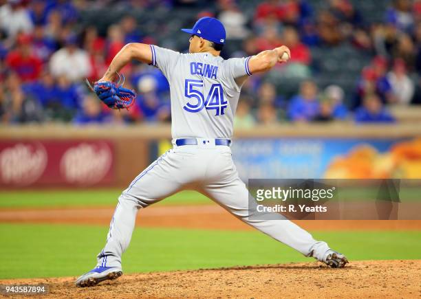 Roberto Osuna of the Toronto Blue Jays throws in the ninth inning against the Texas Rangersat Globe Life Park in Arlington on April 6, 2018 in...