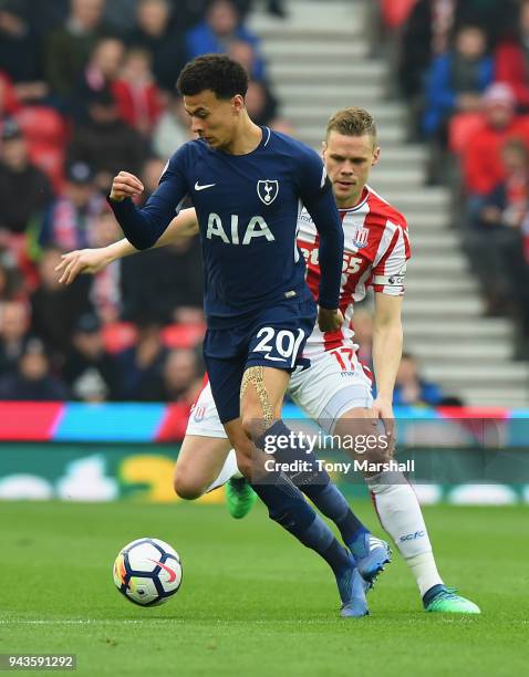 Ryan Shawcross of Stoke City closes down Dele Alli of Tottenham Hotspur during the Premier League match between Stoke City and Tottenham Hotspur at...