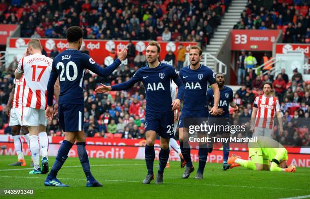 Christian Eriksen of Tottenham Hotspur celebrates scoring their first goal during the Premier League match between Stoke City and Tottenham Hotspur...