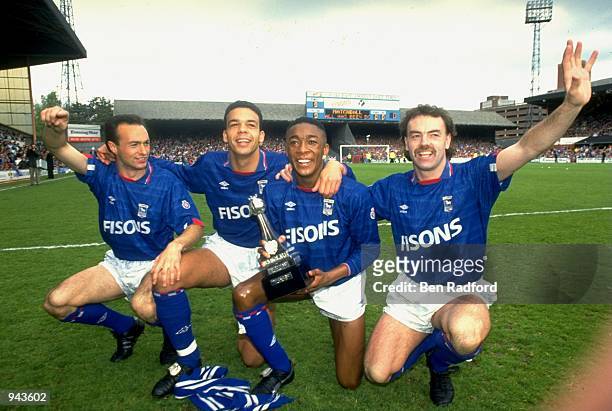 Simon Milton, Jason Dozzell, Chris Kiwomya and John Wark of Ipswich Town celebrate after becoming League Division Two Champions after a 1-1 draw with...