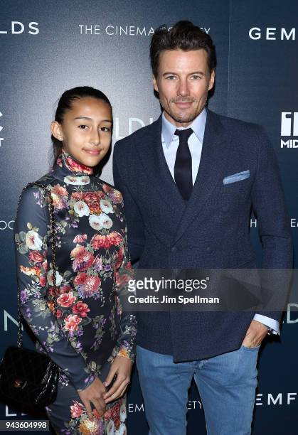 Model Alex Lundqvist and daughter attend the screening of IFC Midnight's "Wildling" hosted by The Cinema Society and Gemfields at iPic Theater on...