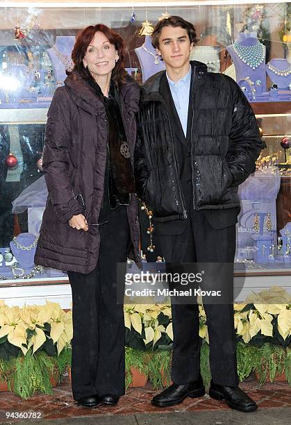 Actress Marilu Henner and her son Nicholas Morgan Lieberman attend the House Of Taylor Grand Opening at Luxury Jewels of Beverly Hills on December...