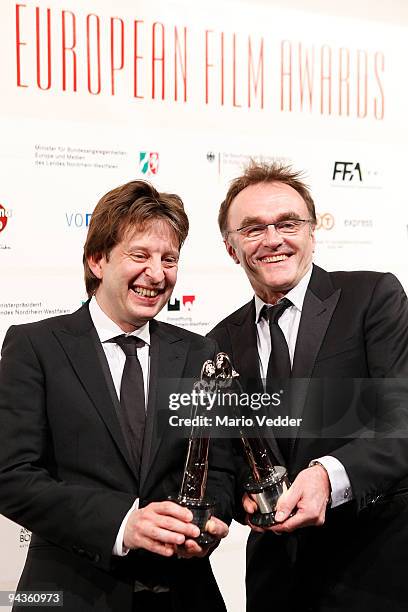 Director Danny Boyle and Producer Christian Colson present their award at the 22nd European Film Awards at the Jahrhunderthalle on December 12, 2009...