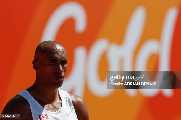Canada's Damian Warner competes in the athletics men's decathlon shot put during the 2018 Gold Coast Commonwealth Games at the Carrara Stadium on the...
