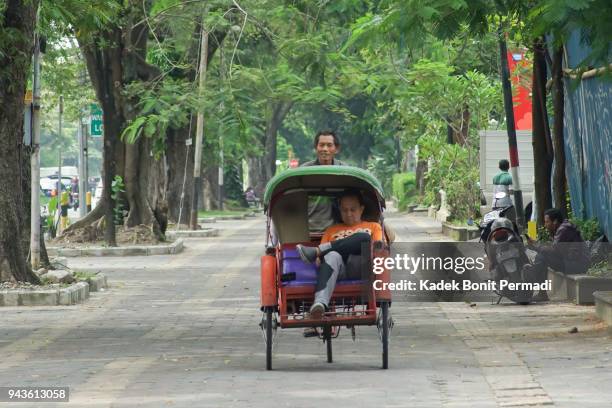 traditional rickshaw - minangkabau stock pictures, royalty-free photos & images