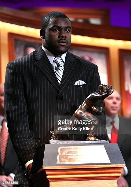 Running back Mark Ingram of the Alabama Crimson Tide poses next to the trophy after being named the 75th Heisman Trophy winner at the Nokia theater...