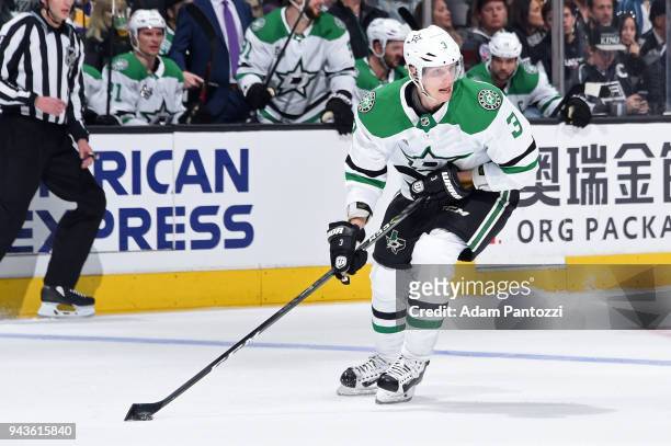 John Klingberg of the Dallas Stars handles the puck during a game against the Los Angeles Kings at STAPLES Center on April 7, 2018 in Los Angeles,...