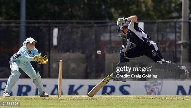 Jess Cameron of the Spirit avoids a run out during the WNCL match between the New South Wales Breakers and the Victoria Spirit at Manly Oval on...