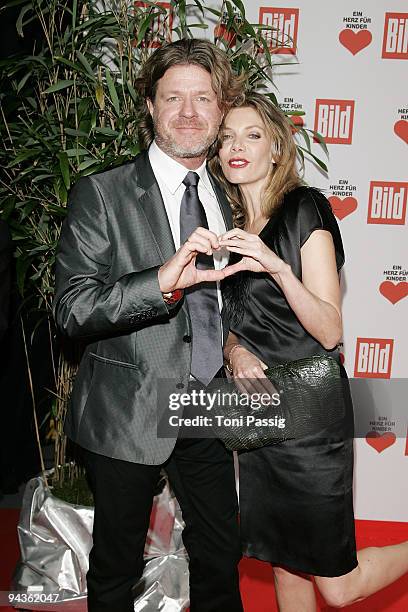 Christian Soegtrop and girlfriend Sophie Schuett, actress attend the 'Ein Herz fuer Kinder' Gala at Studio 20 at Adlershof on December 12, 2009 in...