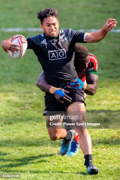 Oscar Ouma of Kenya puts a tackle on Rocky Khan of New Zealand during the HSBC Hong Kong Sevens 2018 Semi-Finals match between Kenya and New Zealand...