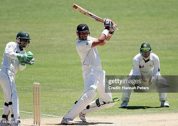 Daryl Tuffey of New Zealand cuts the ball away for four runs during day three of the Third Test match between New Zealand and Pakistan at McLean Park...