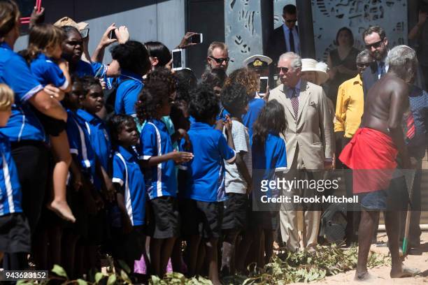 Prince Charles, Prince of Wales is greeted by local students as he departs the Buku-Larrnggay Centre on April 9, 2018 in Gove, Australia. The Prince...