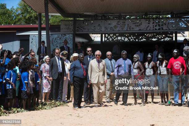 Prince Charles, Prince of Wales is greeted by local students as he departs the Buku-Larrnggay Centre on April 9, 2018 in Gove, Australia. The Prince...