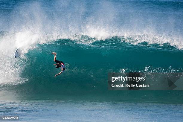 Joel Parkinson of Australia free falls from the lip of a wave during Round 3 of the Billabong Pipeline Masters. Parkinson had just lost the heat thus...