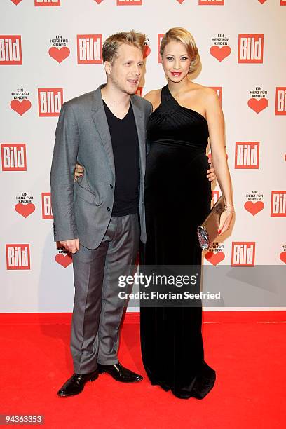 Oliver Pocher and girlfriend Sandy Meyer-Woelden attend the 'Ein Herz fuer Kinder' Gala at Studio 20 at Adlershof on December 12, 2009 in Berlin,...