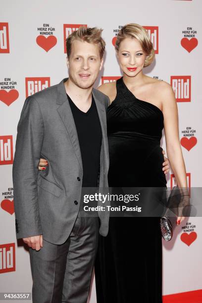 Sandy Meyer-Woelden and boyfriend Oliver Pocher attend the aftershow party of 'Ein Herz fuer Kinder' Gala at Studio 20 at Adlershof on December 12,...