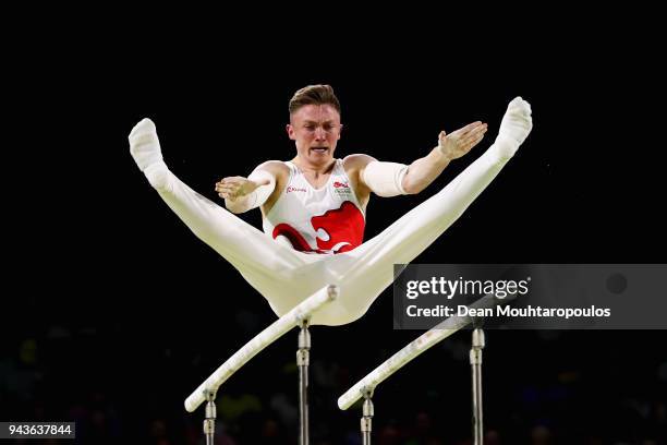 Nile Wilson of England competes in the Men's Parallel Bars Final during Gymnastics on day five of the Gold Coast 2018 Commonwealth Games at Coomera...