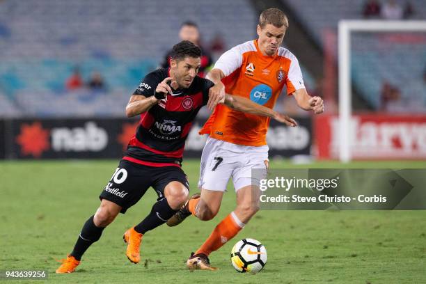 Alvaro Cejudo of the Wanderers gets past Roars Thomas Kristensen during the round 26 A-League match between the Western Sydney Wanderers and the...