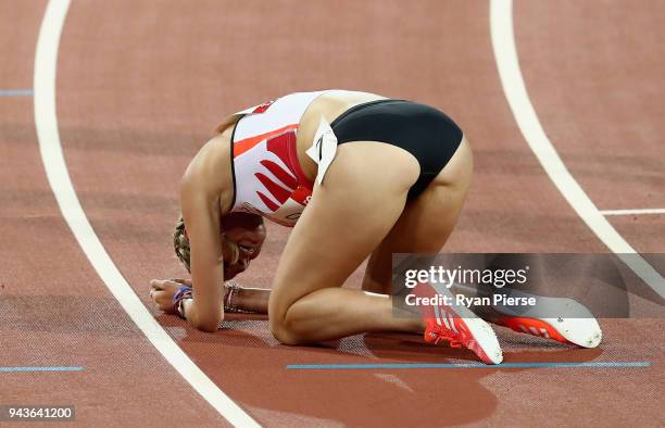 Jessica Judd of England reacts after the Women's 1500 metres heats during the Athletics on day five of the Gold Coast 2018 Commonwealth Games at...