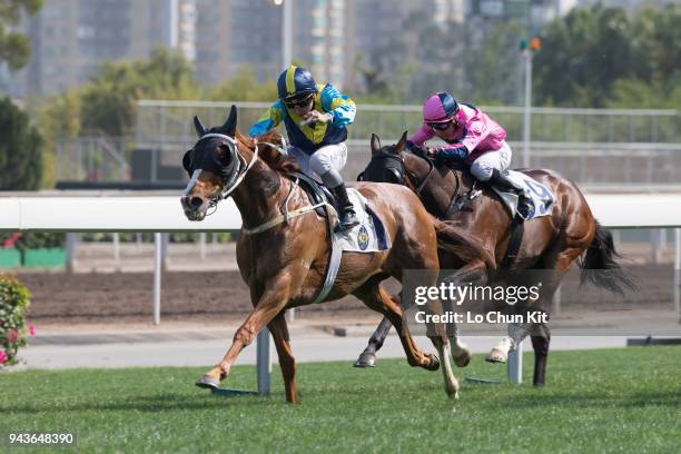 Jockey Matthew Poon Ming-fai riding Jolly Gene wins Race 6 Dongcheng District Handicap at Sha Tin racecourse on April 8 , 2018 in Hong Kong, Hong...