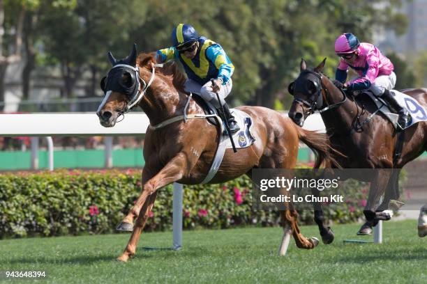 Jockey Matthew Poon Ming-fai riding Jolly Gene wins Race 6 Dongcheng District Handicap at Sha Tin racecourse on April 8 , 2018 in Hong Kong, Hong...