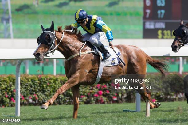 Jockey Matthew Poon Ming-fai riding Jolly Gene wins Race 6 Dongcheng District Handicap at Sha Tin racecourse on April 8 , 2018 in Hong Kong, Hong...