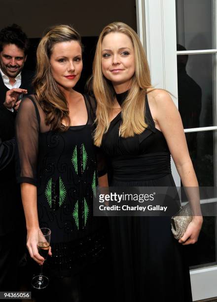 Actresses Catherine Robinson and Marisa Coughlan attend an evening of fashion and compassion hosted by Zooey Deschanel and Emily Deschanel with...
