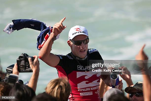 Mick Fanning of Australia celebrates winning his second ASP World Title at the Billabong Pipeline Masters on December 12, 2009 at the Banzai...