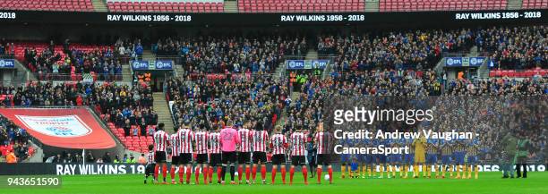 Lincoln City and Shrewsbury Town players pay respect to the late Ray Wilkins prior to the Checkatrade Trophy Final match between Lincoln City and...