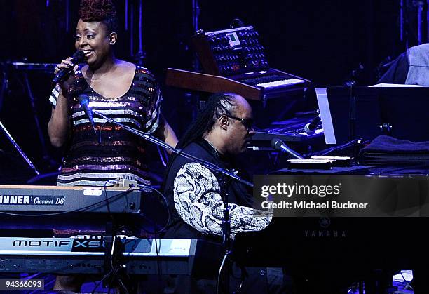 Singer Legacy and Stevie Wonder perform at Stevie Wonder's House Full of Toys Benefit Concert at Nokia LA Live on December 12, 2009 in Los Angeles,...